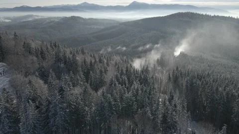 Drone flight above the snow-covered mountains2 Stock Footage 147980487