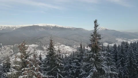 Drone flight above the snow-covered mountains Stock-Footage 147980501