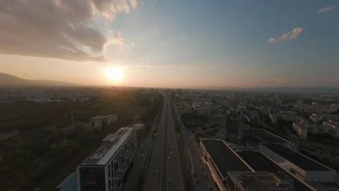 Drone flight above Tsarigradsko Shose Boulevard at sunset in Sofia, Bulgaria. Stock Footage 340270193