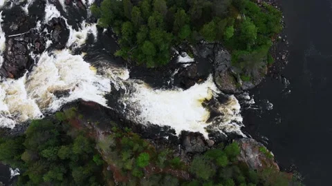 Drone Flight Above the Water Flow of Kivakkakoski waterfall Stock Footage 162192332