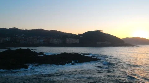 Drone flight above the waves clashing on the rocks in Baiona, Galicia, Spain Stock Footage 122467136