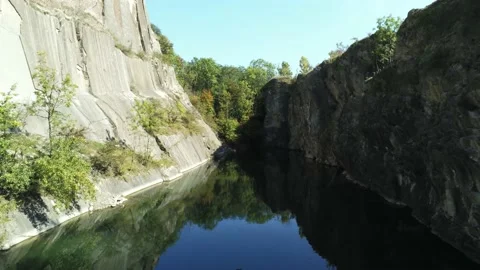 Drone Flight Aerial Over A Mountain Lake, A Hidden Lake in Prague, Stock Footage 213499057