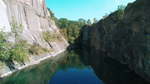 Drone Flight Aerial Over A Mountain Lake, A Hidden Lake in Prague, Stock Footage 213499151