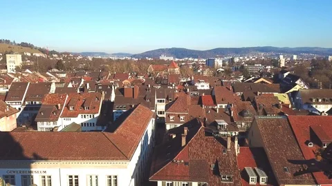 Drone flight with aerial view above church in old town Stock Footage 107083013