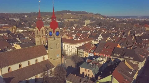 Drone flight with aerial view above church in old town Stock Footage 107083361