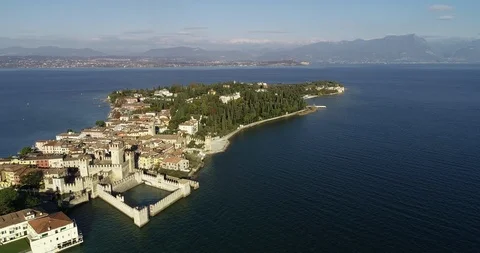 Drone Flight Aerial View of the beautiful Sirmione Castle in Garda Lake - Italy. 스톡 동영상 101343569
