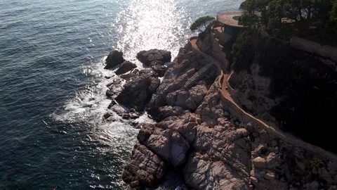 Drone Flight Along Backlit Rocky Coast, Sunrise or Sunset, Costa brava, Spain Stock Footage 306016519