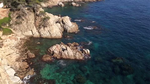 Drone Flight Along Backlit Rocky Coast, Sunrise or Sunset, Costa brava, Spain Stock Footage 306016523