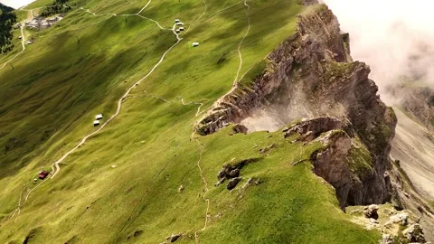 Drone Flight Along the Cliff Edge of Seceda Mountain, Dolomites Stock Footage 313891963