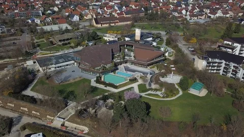 Drone flight along the empty thermal bath in Beuren on the Swabian Alps, Germany Stock Footage 126970495