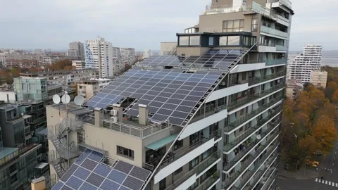 Drone flight along the facade of a modern office or residential building with Stock Footage 257565665