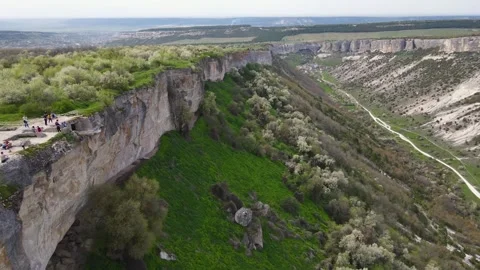 Drone flight along the gorge of the limestone mountains. Stock Footage 254051132
