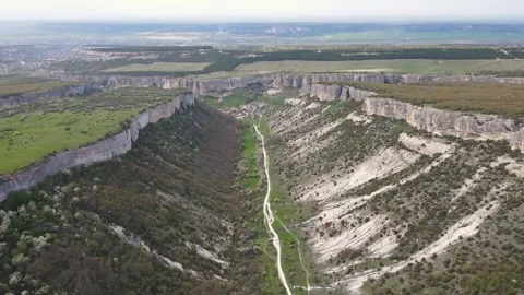 Drone flight along the gorge of the limestone mountains. Stock Footage 254051161