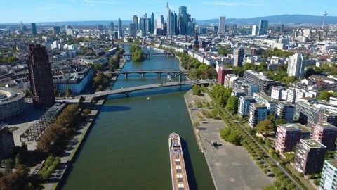 Drone Flight Along Main River Toward Frankfurt Skyline and City Bridges Video stock 346885775