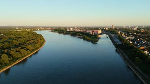 Drone Flight Along Rhine River Against Current Near Harbor in Cologne Niehl Nord Stock Footage 312526549