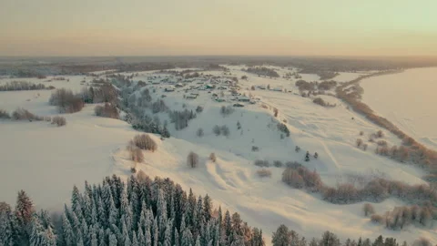A drone flight along the river and over the northern village. Video stock 168097732