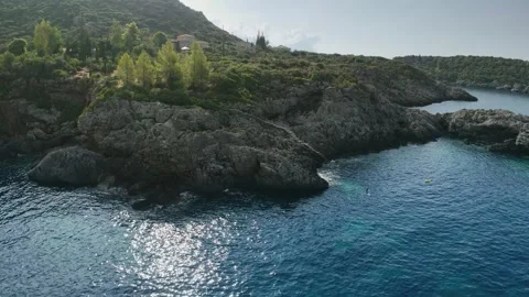 Drone Flight Along Rocky Coast and Sea Cave Greece Stock Footage 336839840