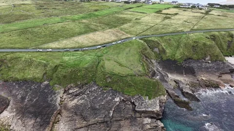 Drone flight aove the Atlantic rocky coast of Mullaghmore Head, Ireland. Stock Footage 341730433