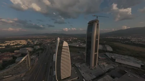 Drone flight approaching modern skyscrapers at golden hour in Sofia, Bulgaria. Stock Footage 340270218