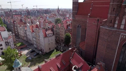 Drone flight around the ancient cathedral in the center of the old European town Stock Footage 211082458