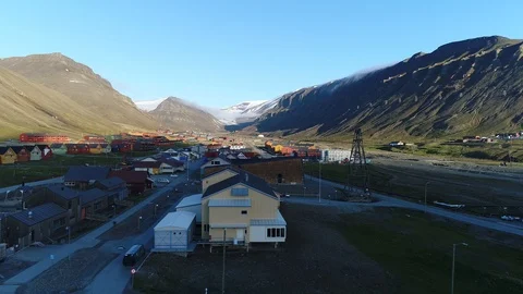 Drone flight around the high arctic city of Longyearbyen in Svalbard Stock Footage 95456174