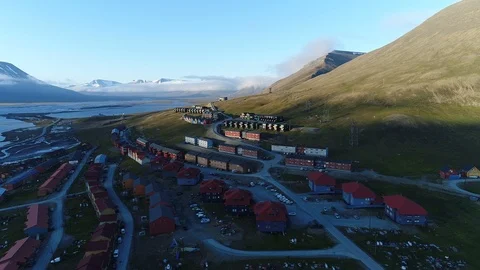Drone flight around the high arctic city of Longyearbyen in Svalbard Stock Footage 95456181