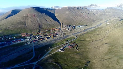Drone flight around the high arctic city of Longyearbyen in Svalbard Stock Footage 95456246
