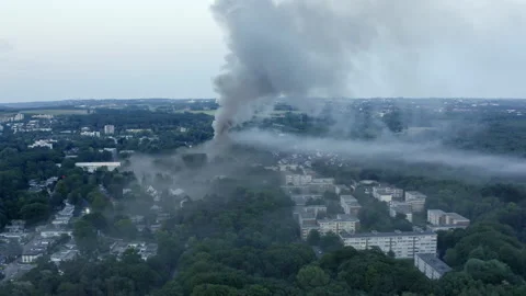 Drone flight around a major fire at a school in the town of Erkrath in North Stock Footage 163041468