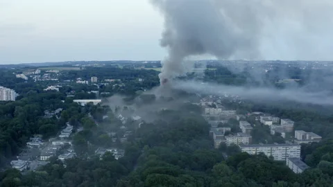 Drone flight around a major fire at a school in the town of Erkrath in North Stock Footage 163042078