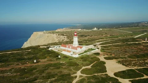 Drone flight around the modern lighthouse of Cabo Espichel Stock Footage 104076714