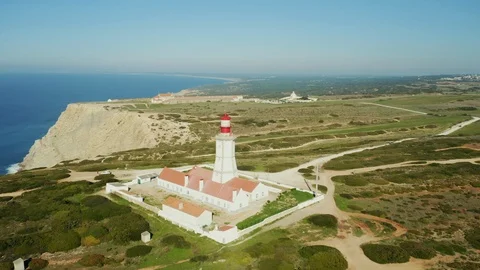 Drone flight around the modern lighthouse of Cabo Espichel Video stock 104077542