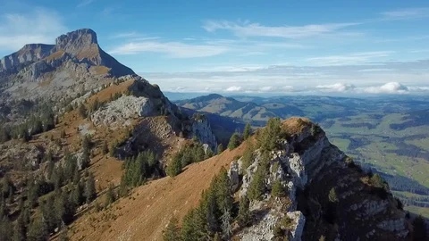 Drone flight around mountain with forest in Swiss alps. Stock Footage 107087003