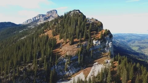 Drone flight around mountain with forest in Swiss alps. Stock Footage 107087280