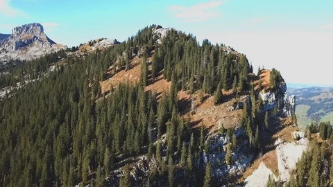 Drone flight around mountain with forest in Swiss alps. Stock Footage 107087328