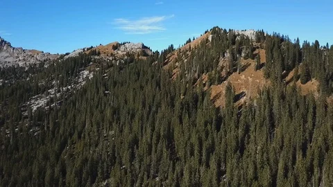 Drone flight around mountain with forest in Swiss alps. Stock Footage 107087364