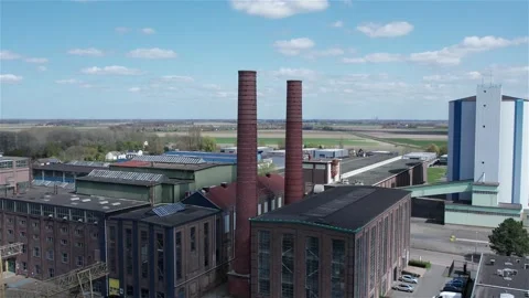 Drone Flight Around Old Closed Factory with Red Chimneys Stock Footage 275156422