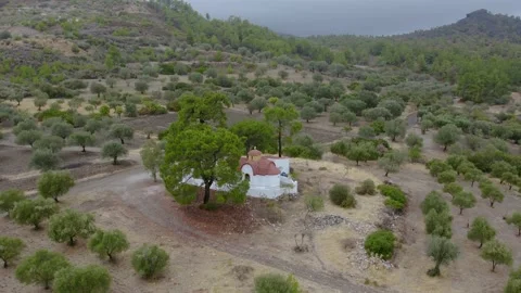 Drone flight around the temple on the jetty in the mountains Vídeos de archivo 168951409