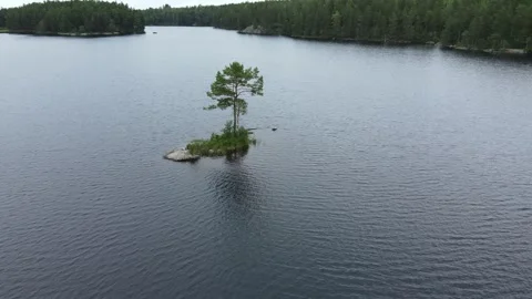 Drone flight around a very small island in Sweden. Stock Footage 248099230