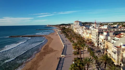 Drone flight back over in along coast beautiful beaches surrounded by Palm trees Video stock 238565258
