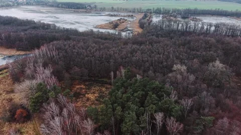 Drone Flight Back over Quiet Waters, Reflections of the Sky, Landscape Stock Footage 323331063