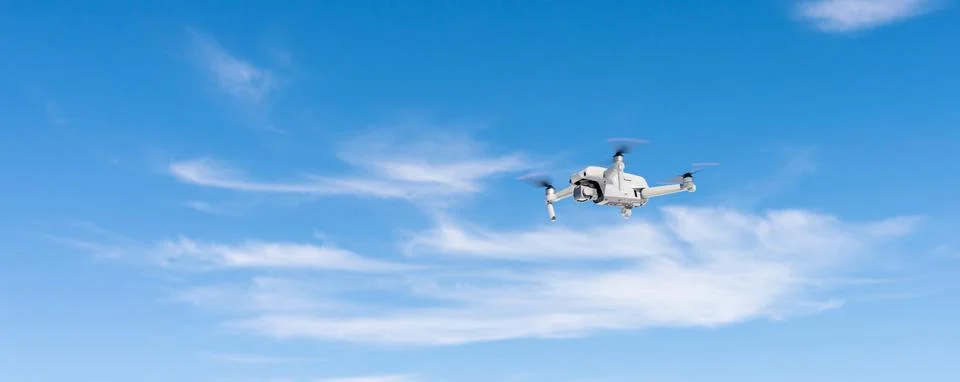Drone flight on the background of clouds Stock Photos