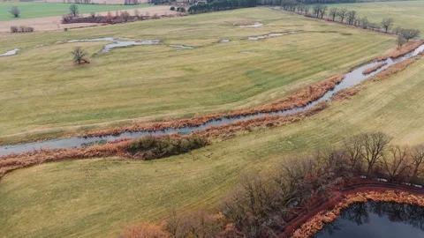 Drone Flight Backward Revealing Fish Ponds, River Barycz Valley Stock Footage 323330889