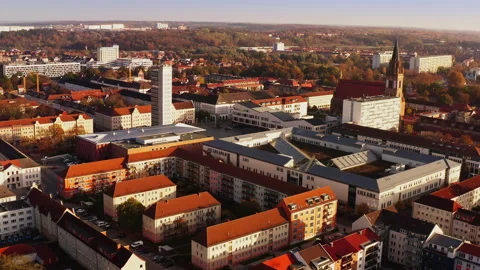 Drone flight backwards over Neubrandenburg with a view of the famous St. Marien Stock Footage 239106619