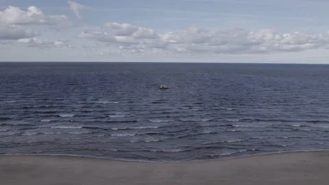 Drone flight from a beautiful beach over sea to the sunken ship Lady Kotlin Stock-Footage 160287879