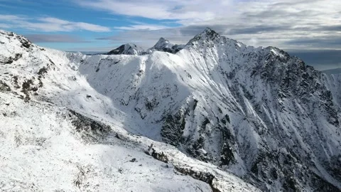 Drone flight in beautiful mountain landscape with snow. Alps, Italy. Nature 4K Stock Footage 148031452
