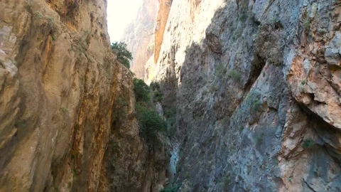 Drone flight between rocks Extreme canyon aerial flying Bird's eye view of the Stock Footage 229618083
