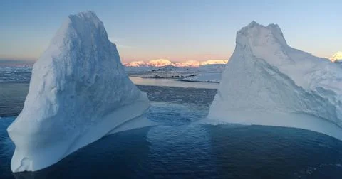 Drone flight between two icebergs in Antarctica Stock Photos