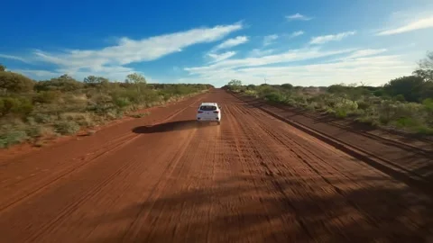 Drone flight of a car chase in the outback, Australia Stock Footage 262931088