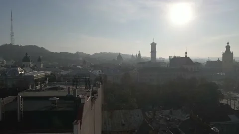 Drone flight to the central square of the city, morning traffic Stock Footage 163824804