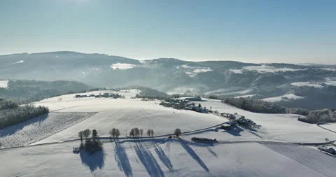 Drone Flight in a Cinematic Winter landscape at South Bavaria Stock Footage 227951887